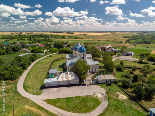 Summer rural landscape with orthodox temple in Russia