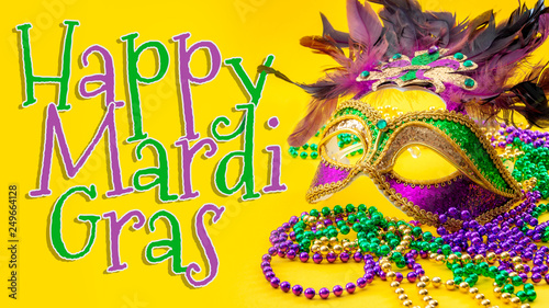 Fotografie Happy Mardi Gras and Fat Tuesday carnival concept theme with close up on a face