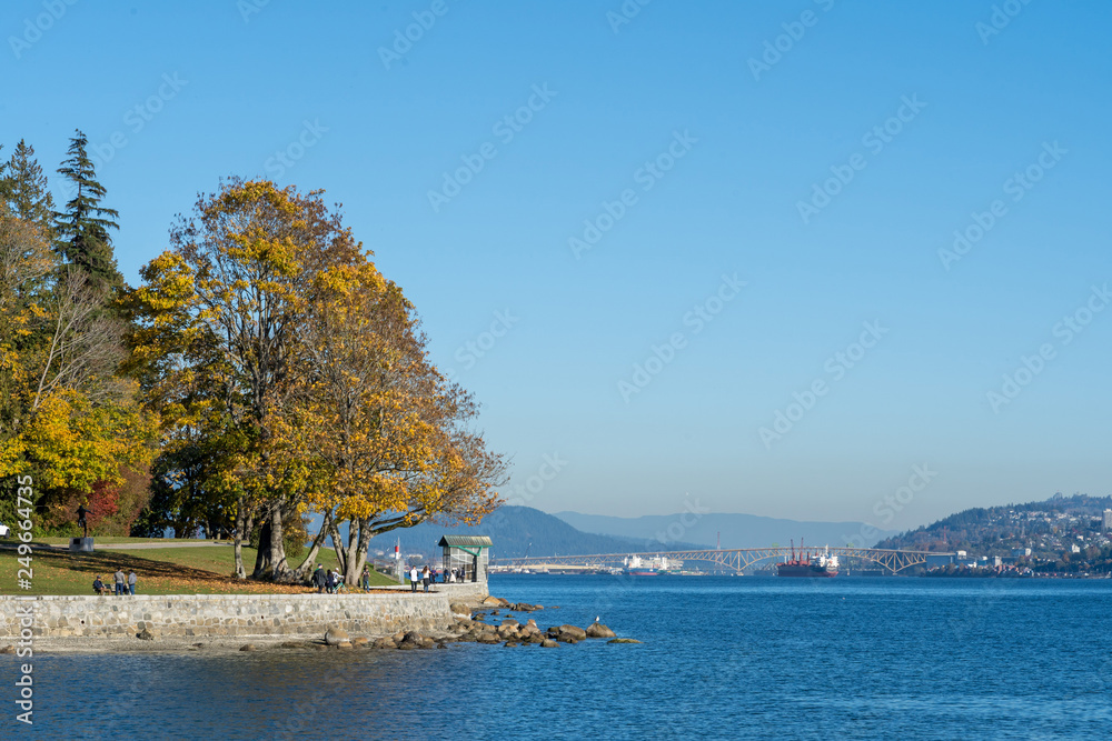 Stanley Park and seawall in Vancouver, Canada. It is largest urban park with beaches, trails, scenic seawall. It's a top attraction for tourist in Vancouver, British Columbia