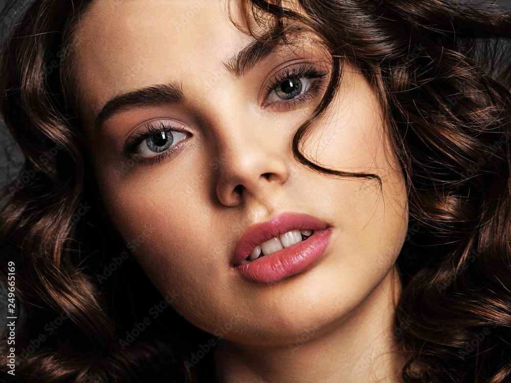 Portrait of a beautiful woman with a smoky eye makeup Portrait of a beautiful woman with a smoky eye makeup