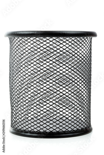 Black metal urn, pen and pencil stand on white background