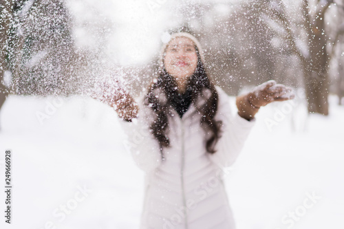 Beautiful young asian woman smiling happy for travel in snow winter season