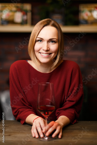 Picture of young woman with wine glass