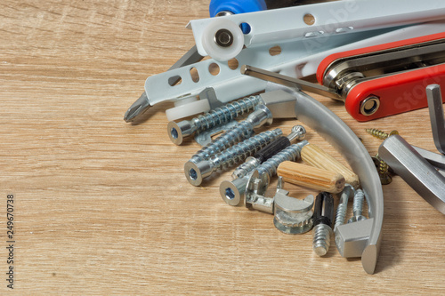 A set of tools and fasteners for the assembly of furniture