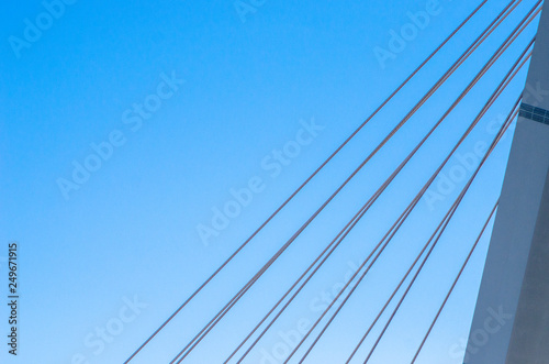Wallpaper Mural Cable-stayed bridge close-up against the blue sky. White bridge structure on a blue background. Neutral minimalistic background. Torontodigital.ca