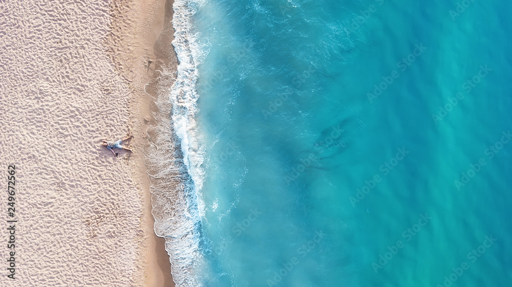 Vacation-image. Aerial view at people on beach. Sea and beach. Aerial view at sea and beach. Seascape from drone. Adventure and travel. Relax time on the beach