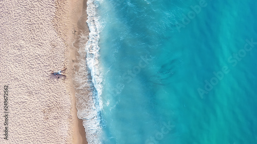 Vacation-image. Aerial view at people on beach. Sea and beach. Aerial view at sea and beach. Seascape from drone. Adventure and travel. Relax time on the beach