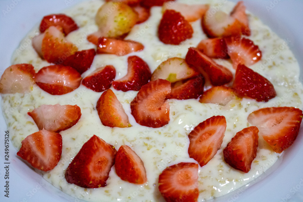 Oatmeal porridge with strawberries for breakfast Oatmeal porridge with strawberries for breakfast