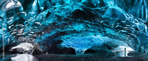 Tablou canvas Blue crystal ice cave and an underground river beneath the glacier