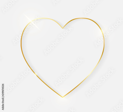 Gold shiny glowing vintage heart frame with shadows isolated on white background. Golden luxury realistic border. Wedding, mothers or Valentines day concept. Xmas and New Year abstract. Vector