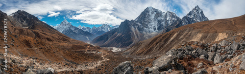 Great panoramic mountain range. Ama Dablam, Kangtega, Tobuche, Taboche. View from The Everest memorial near Dughla village. photo