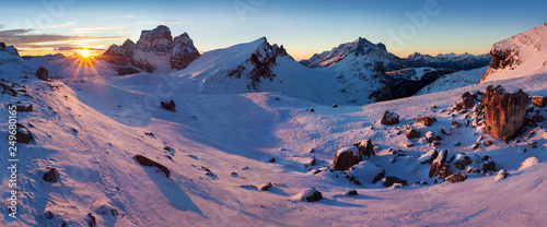 Fantastic sunrise in the Dolomites mountains, South Tyrol, Italy in winter. Italian alpine panorama with steep rocky walls, Monte Pelmo in dramatic light. Christmas or Happ new Year time.