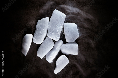 Dry ice on black background 