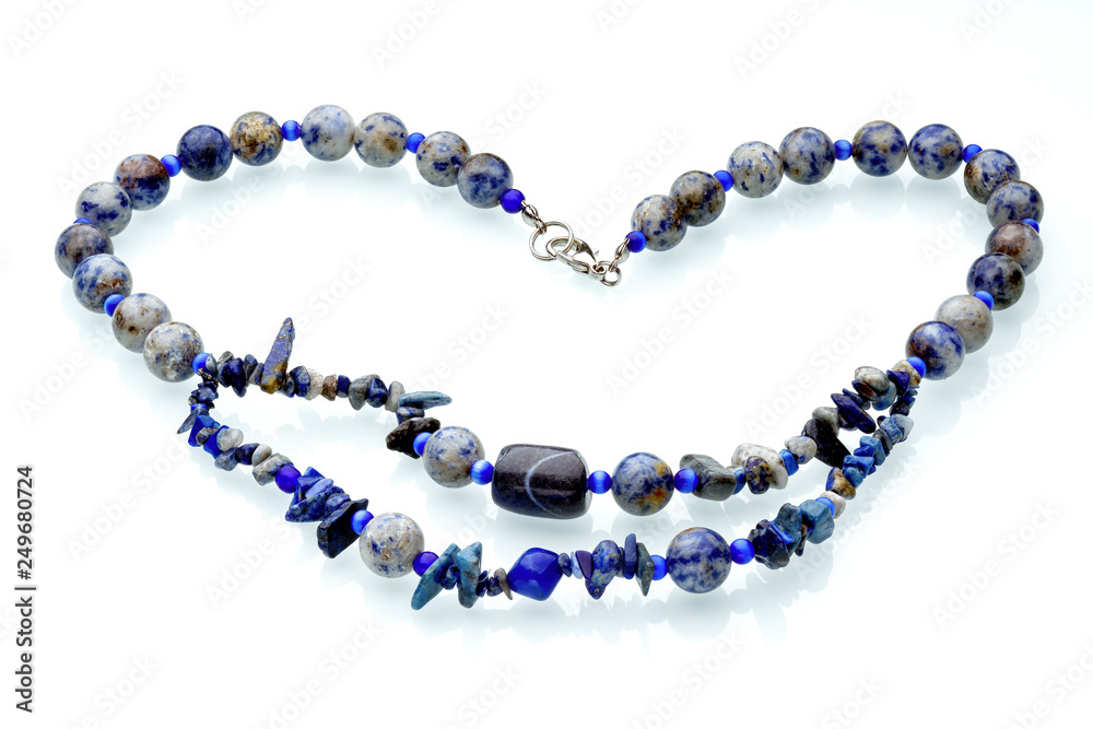 Necklaces, beads, handmade bracelets are made of artificial stone of different breeds. Necklaces, beads, handmade bracelets are made of artificial stone of different breeds.
