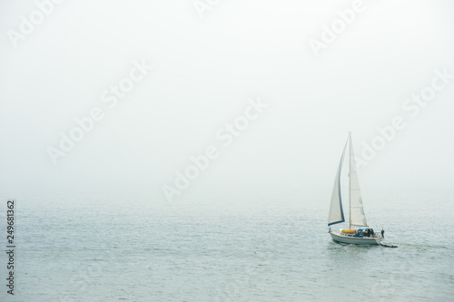 Billede på lærred Sailing in the dense fog in Atlantic ocean near Bass Harbor, Maine, USA