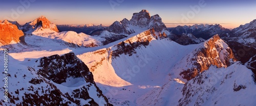 Fantastic sunrise in the Dolomites mountains, South Tyrol, Italy in winter. Italian alpine panorama with steep rocky walls, Monte Pelmo in dramatic light. Christmas or Happ new Year time.