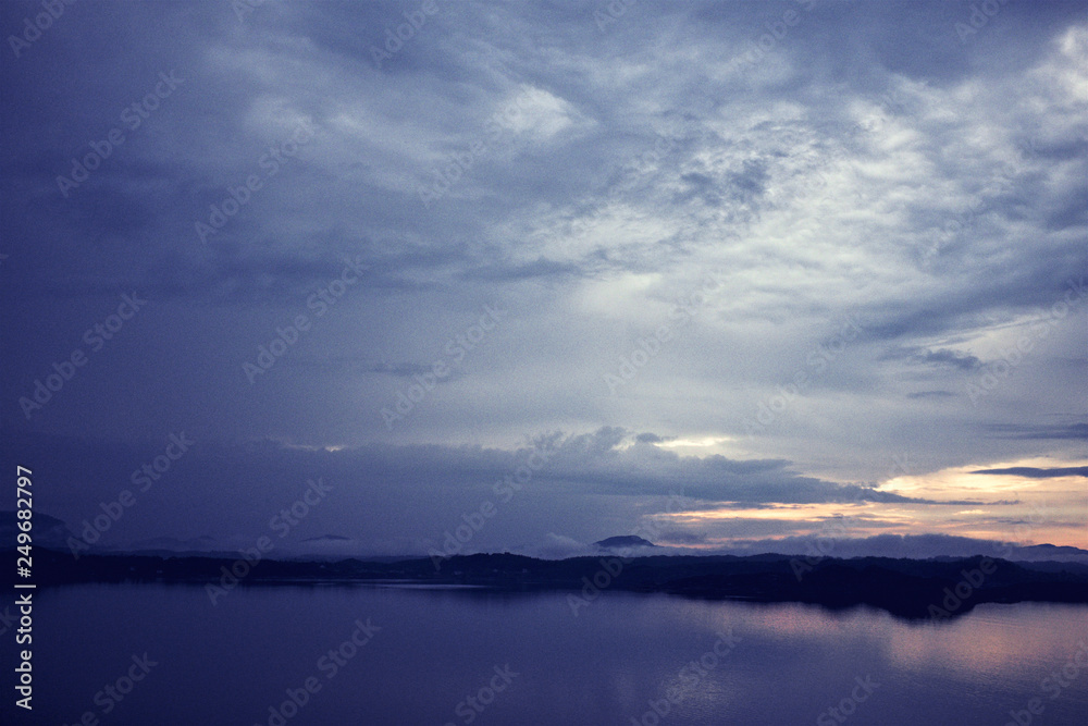 Daybreak scenery over the norwegian sea, beautiful sunrise. Epic dawn sea landscape 