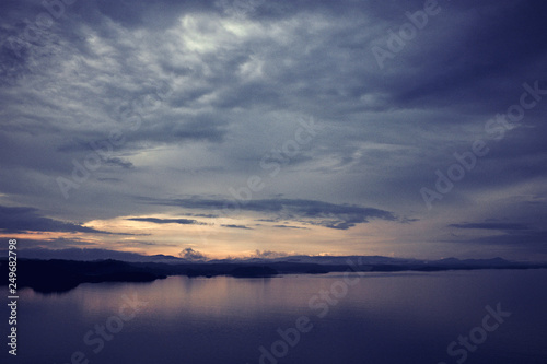 Daybreak scenery over the norwegian sea  beautiful sunrise. Epic dawn sea landscape 