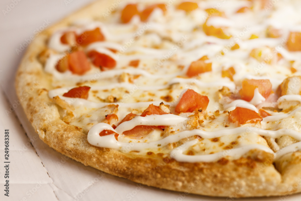 Ranch pizza on cardboard background