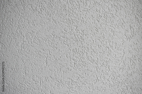 Grey house acrylic plaster facade closeup photo