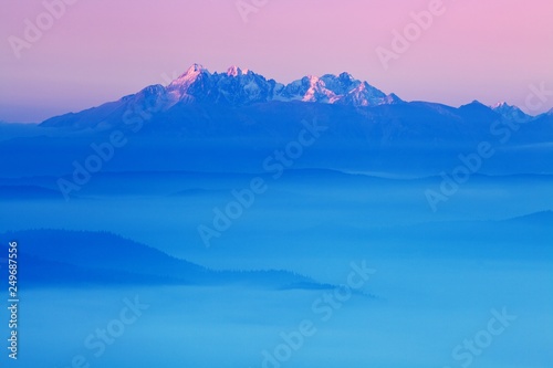 Scenic Landscape view with Soft light in morning beautiful sunrise, cloudy and foggy sea of wave fog look like around the mountain at High Tatras, Slovakia. beautiful landscape of the mountain  photo