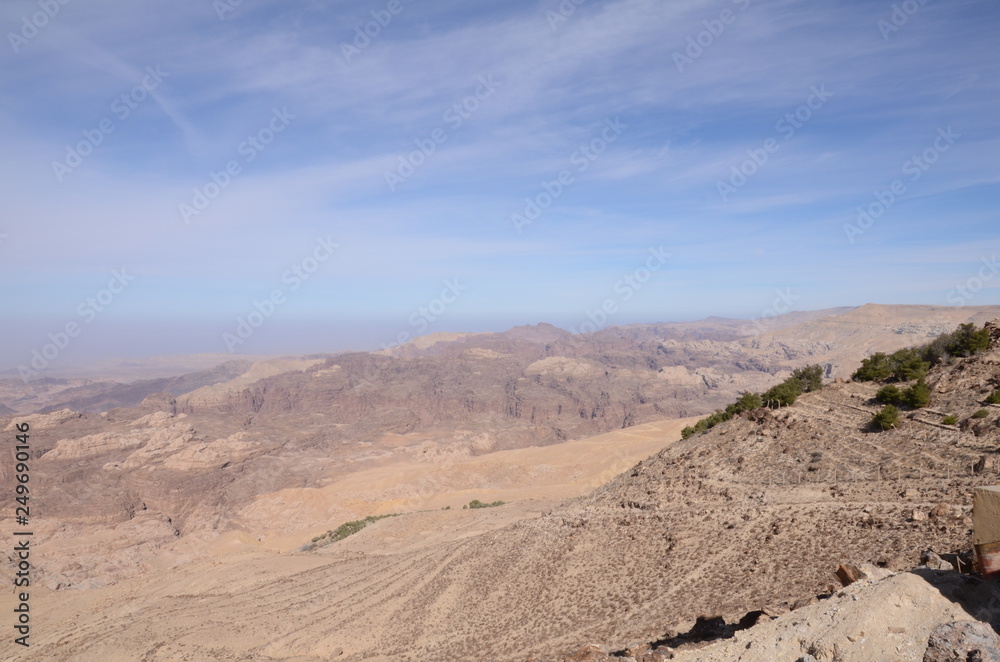 volcanic landscape with rocks and blue sky volcanic landscape with rocks and blue sky