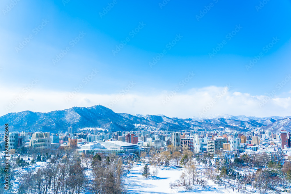 Beautiful architecture building with mountain landscape in winter season Sapporo city Hokkaido Japan