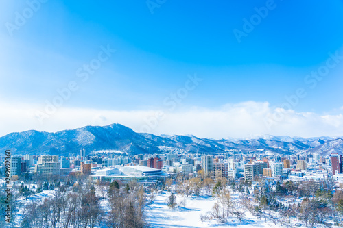 Beautiful architecture building with mountain landscape in winter season Sapporo city Hokkaido Japan