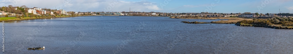 Panorama of Lough Atalia with city buildings