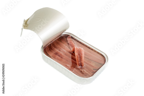 Open tin can of anchovies isolated