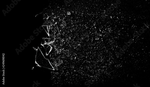 Fotografie Explosion glass, dust and piece texture and background, isolated on black, crack
