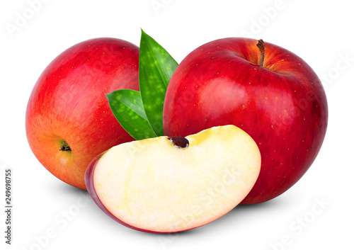 whole and slice fresh red apple with green leaf isolated on white background