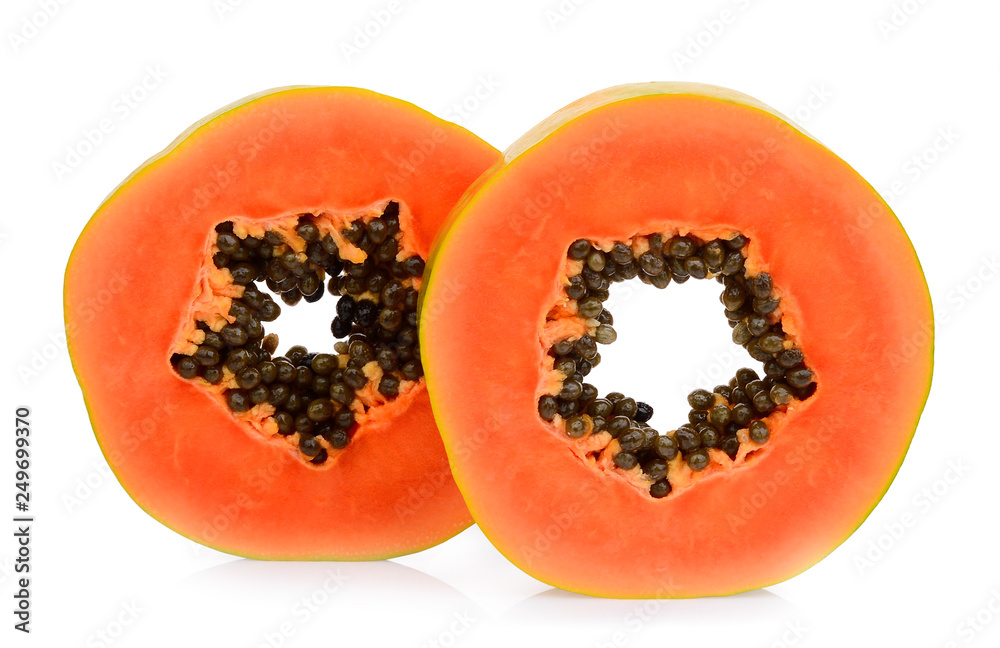 two half cut of ripe papaya fruit with seeds isolated on white background two half cut of ripe papaya fruit with seeds isolated on white background