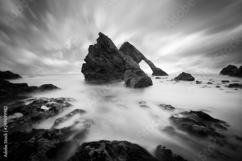The amazing Bow fiddle rock at Cullen Bay, rock formation off the north coast of Scotland Natural sea arch near Portknockie on the north-eastern coast of Scotland. UK 