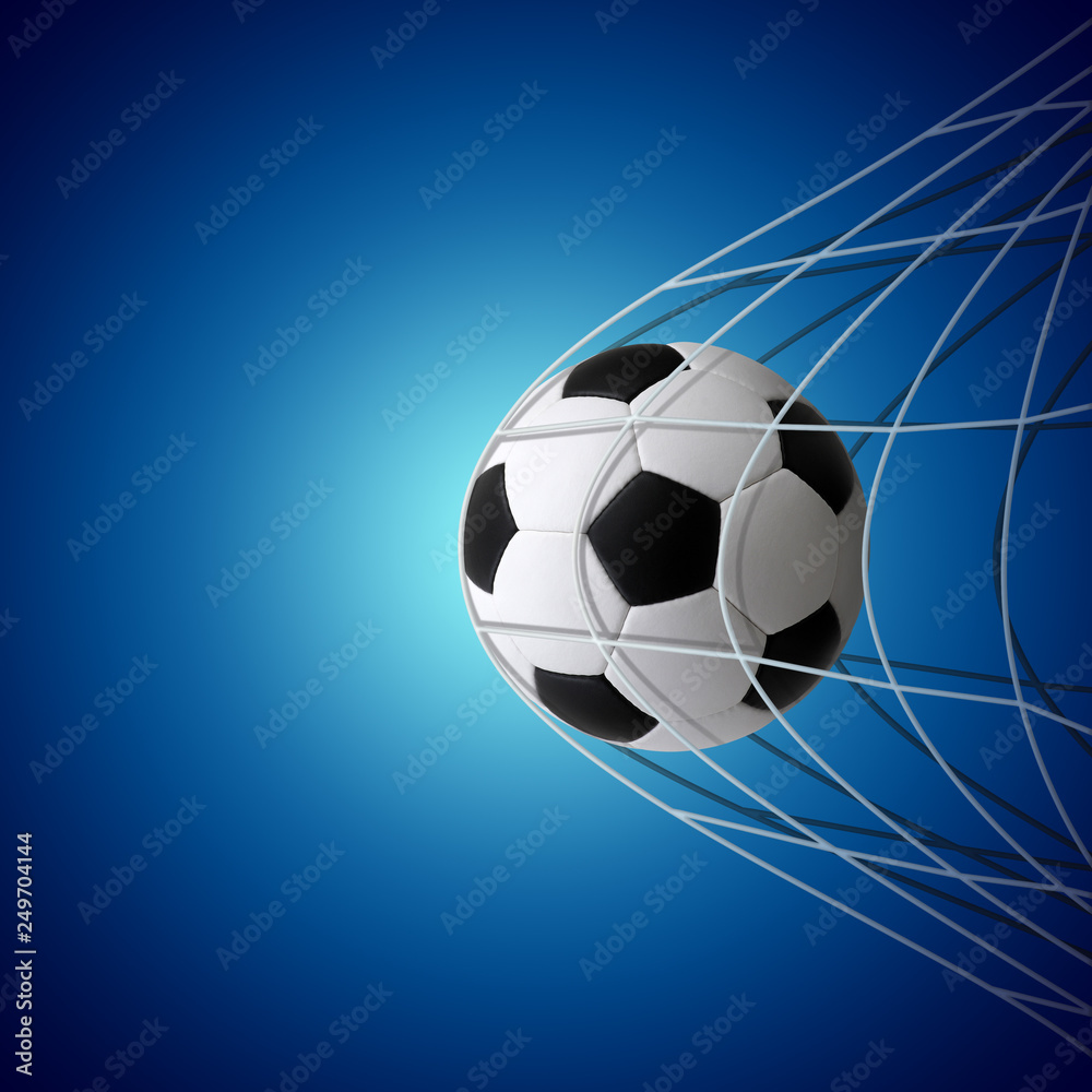 Naklejka premium Soccer ball in goal on blue