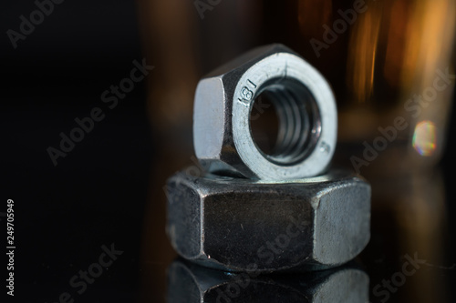 Composition with wrench and nut