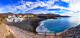 Fuerteventura - picturesque traditional fishing village Ajui, with black beach. Canary islands