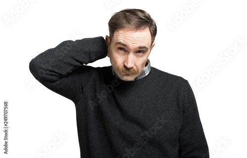 Mature man thinking against a white background