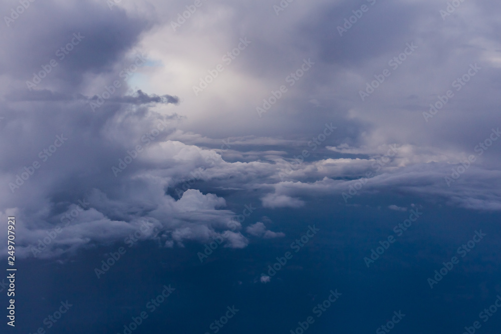 White clouds and blue sky from an airplane