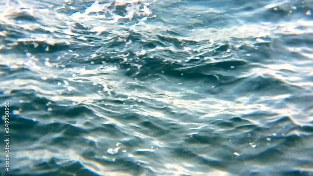 peaceful slow motion nature scene with close up of running ripple on the water surface. Cinematic moving background with meditative and hypnotic effect. Full HD footage 1920x1080. peaceful slow motion nature scene with close up of running ripple on the water surface. Cinematic moving background with meditative and hypnotic effect. Full HD footage 1920x1080.