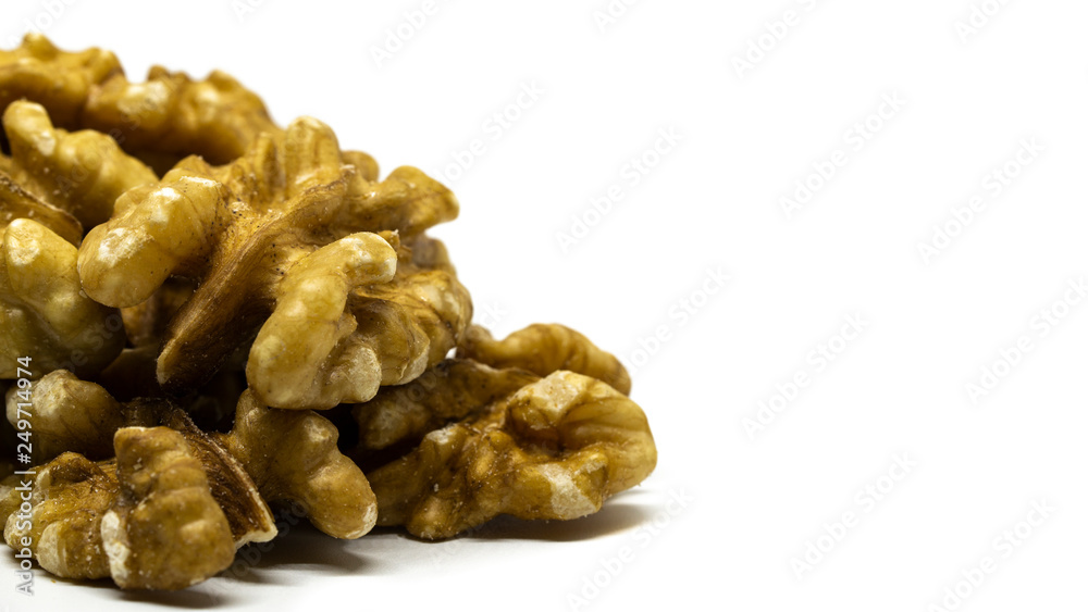 photo of many walnuts isolated on white background photo of many walnuts isolated on white background