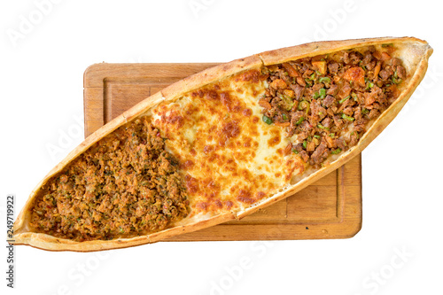 Traditional Turkish Pide or Pita pastry product isolated on white in turkish restaurant.  photo