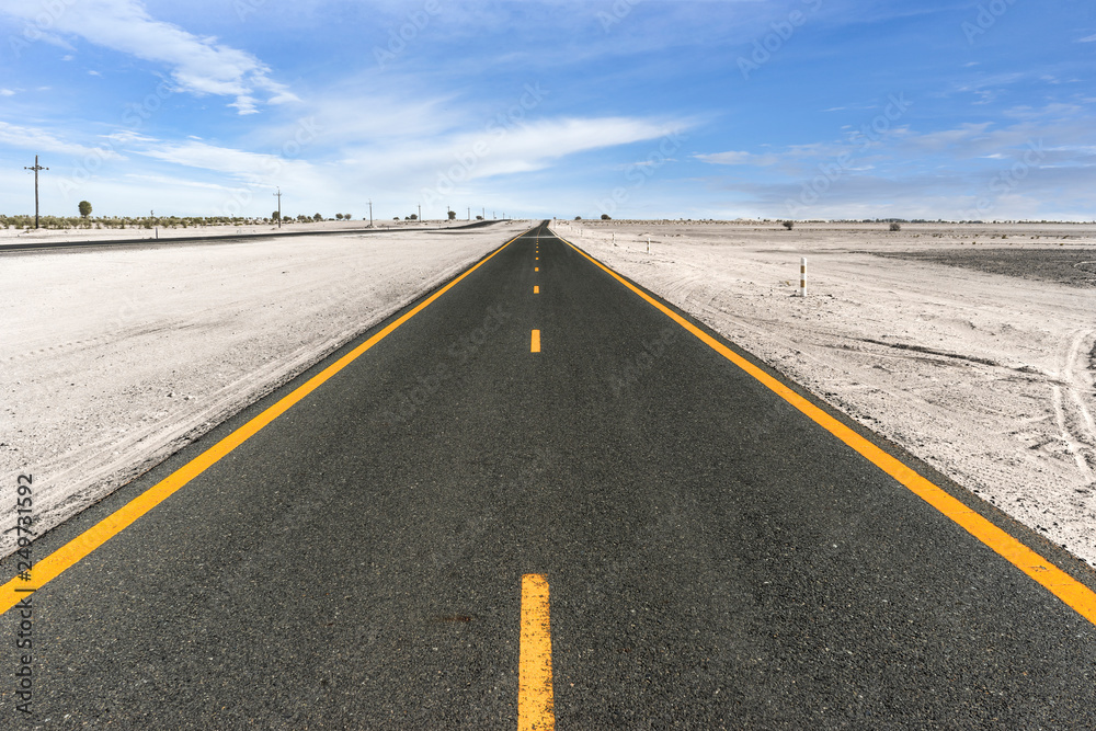 Smooth road stretching far into the empty horizon Smooth road stretching far into the empty horizon