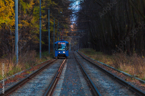 Tram in the park in late autumn
