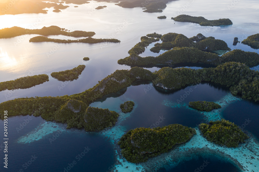 Sunrise and Limestone Islands of Pef in Raja Ampat Sunrise and Limestone Islands of Pef in Raja Ampat