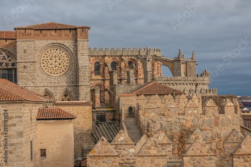 The Cathedral-fortress of Avila, Castile-Leon, Spain. Romanesque and Gothic styles. Its apse froms one of the turrets of the city walls. photo