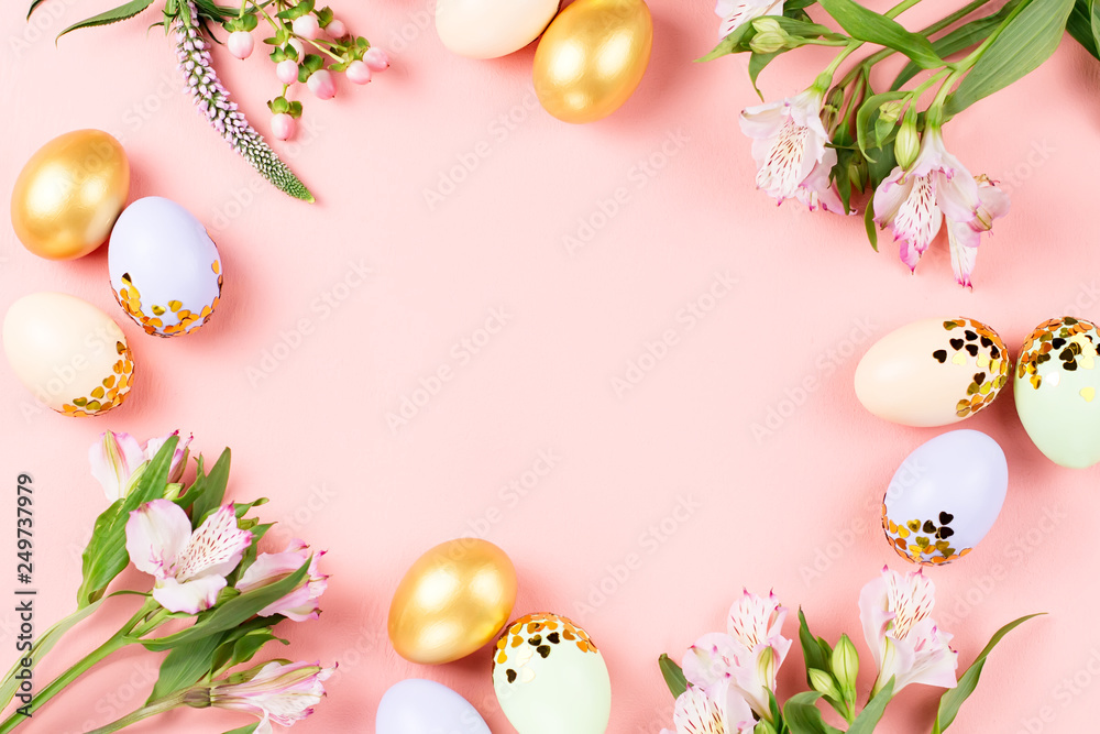 Fototapeta Festive Happy Easter background with decorated eggs, flowers, candy and ribbons in pastel colors on pink. Copy space
