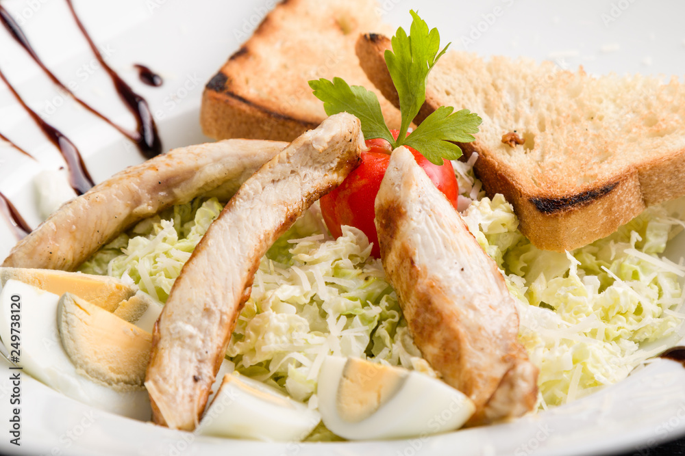 fresh tasty caesar salad appetizer in white plate fresh tasty caesar salad appetizer in white plate