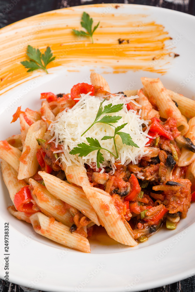 tasty vegetarian penne pasta in white plate tasty vegetarian penne pasta in white plate