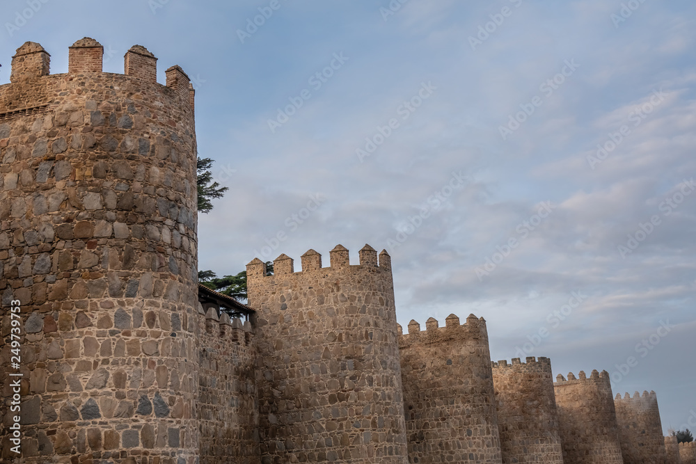 The magnificent medieval walls of Avila, Castile-Leon, Spain. A UNESCO World Heritage Site completed between the 11th and 14th centuries The magnificent medieval walls of Avila, Castile-Leon, Spain. A UNESCO World Heritage Site completed between the 11th and 14th centuries